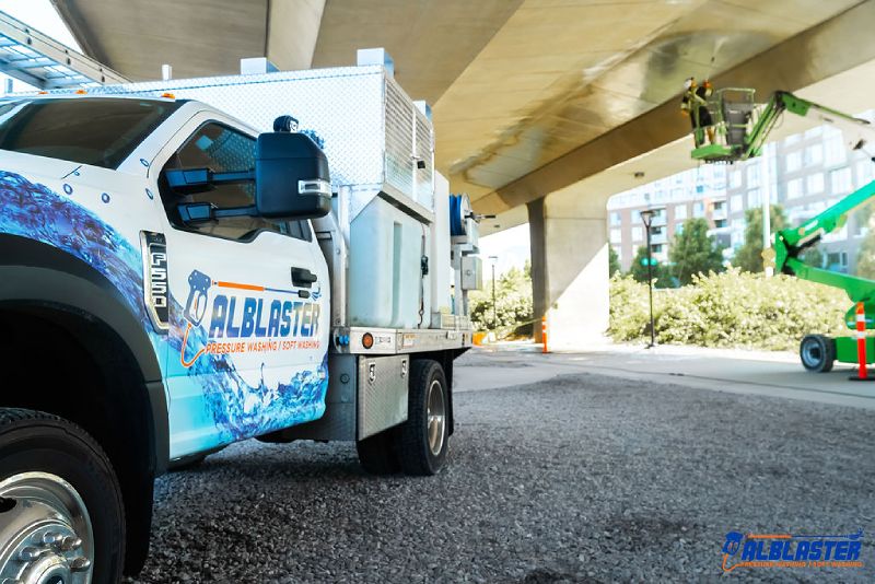 Cambie street pressure washing. The Alblaster truck is in front of the image.